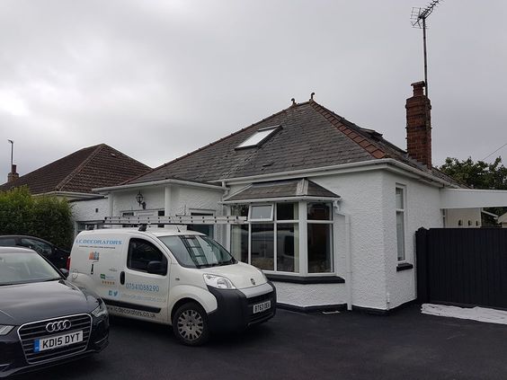 Company van parked out site a house